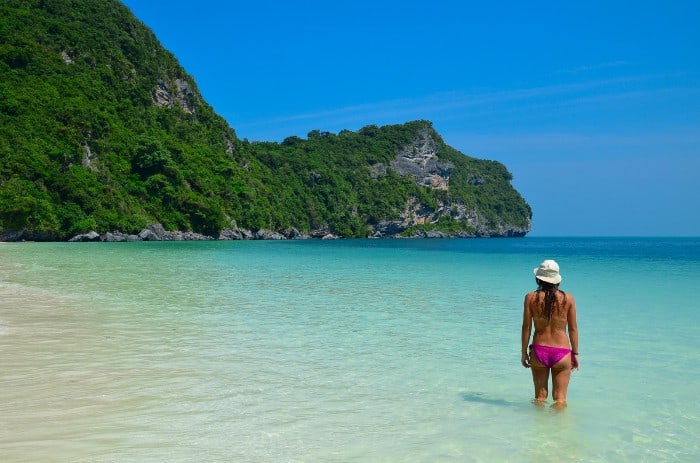 Empty beautiful beach with crystal clear water. DIY kayak tour.