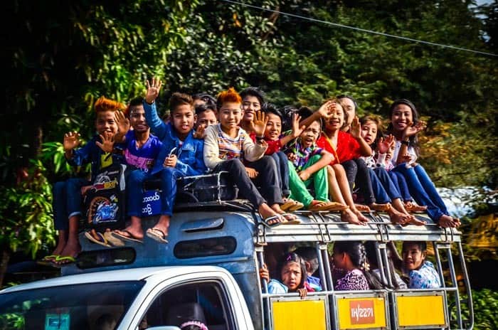 Myanmar children on the roof of a bus, Dawei peninsula.