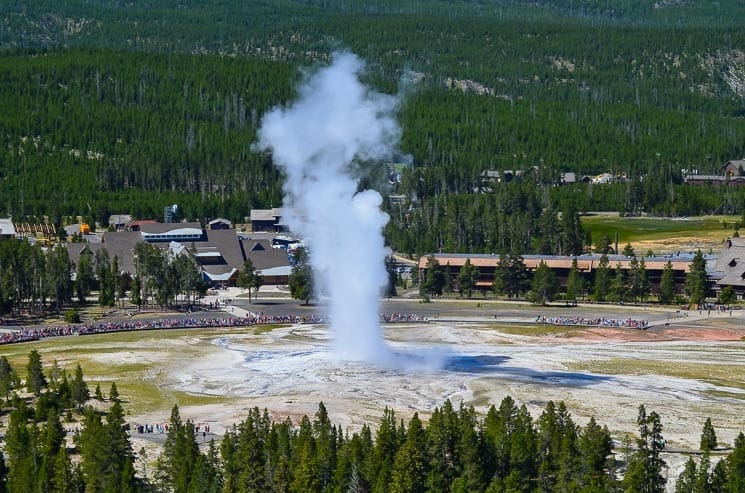 Old Faithful Geyser from the Observation Point (1-hour loop track). Best places to visit in Yellowstone National Park.