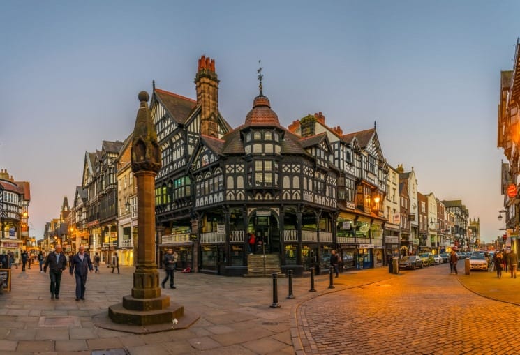 Tudor houses alongside the Bridge street in the central Chester - Day Trips from Liverpool